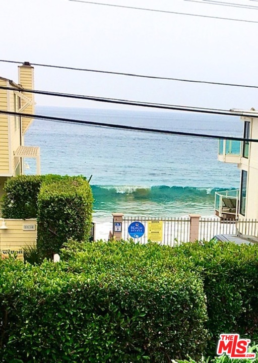 25121 Malibu Road Malibu, CA 90265 - Photo 9 of 16 a view of front door of house with outdoor space