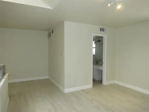 a view of a room with a washer and dryer