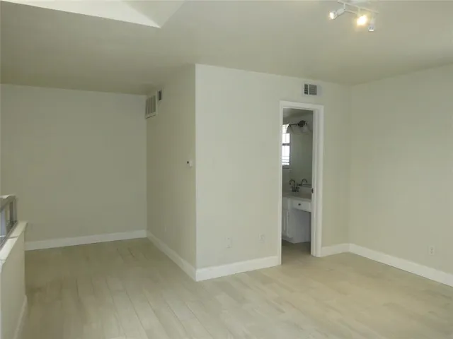 a view of a room with a washer and dryer