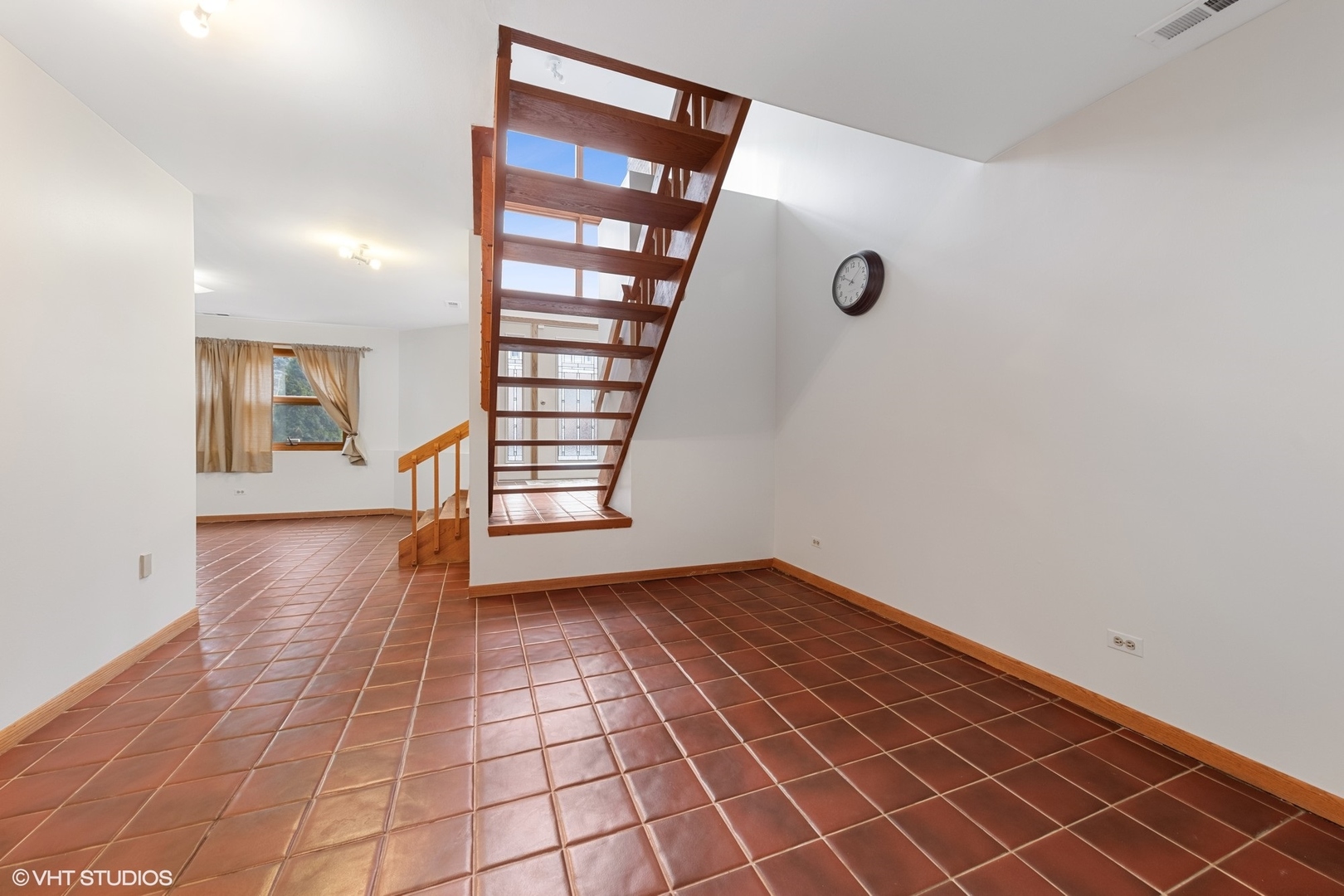 3700 Haas Avenue Riverside, IL 60546 - Photo 5 of 20 a view of an empty room with a window and wooden floor