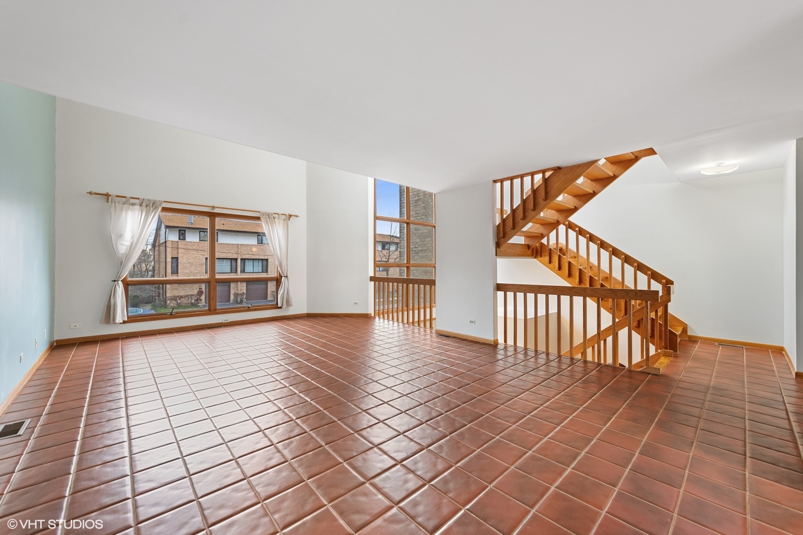 3700 Haas Avenue Riverside, IL 60546 - Photo 6 of 20 a view of an empty room with wooden floor and a window