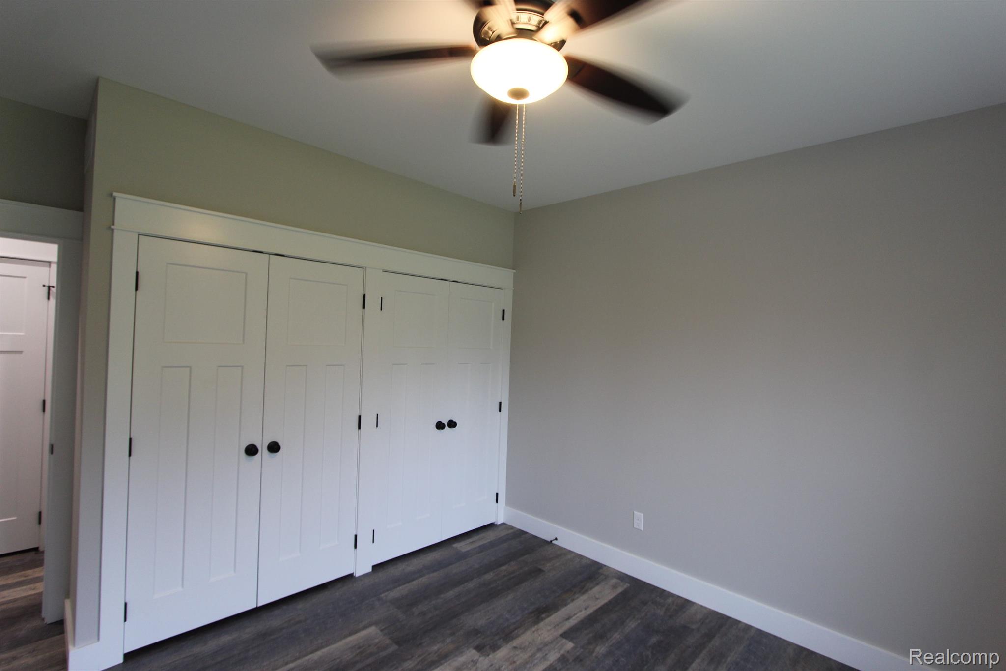 2975 East Coon Lake Road Howell, MI 48843 - Photo 30 of 175 2 BEDROOM CLOSET DOORS WITH BALL/SOCKET CATCH