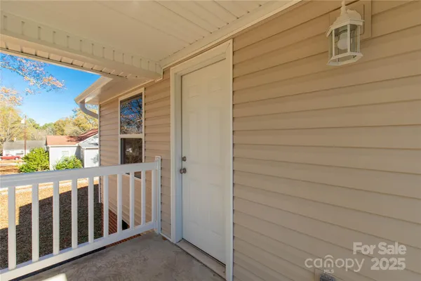 a view of a yard next to a building