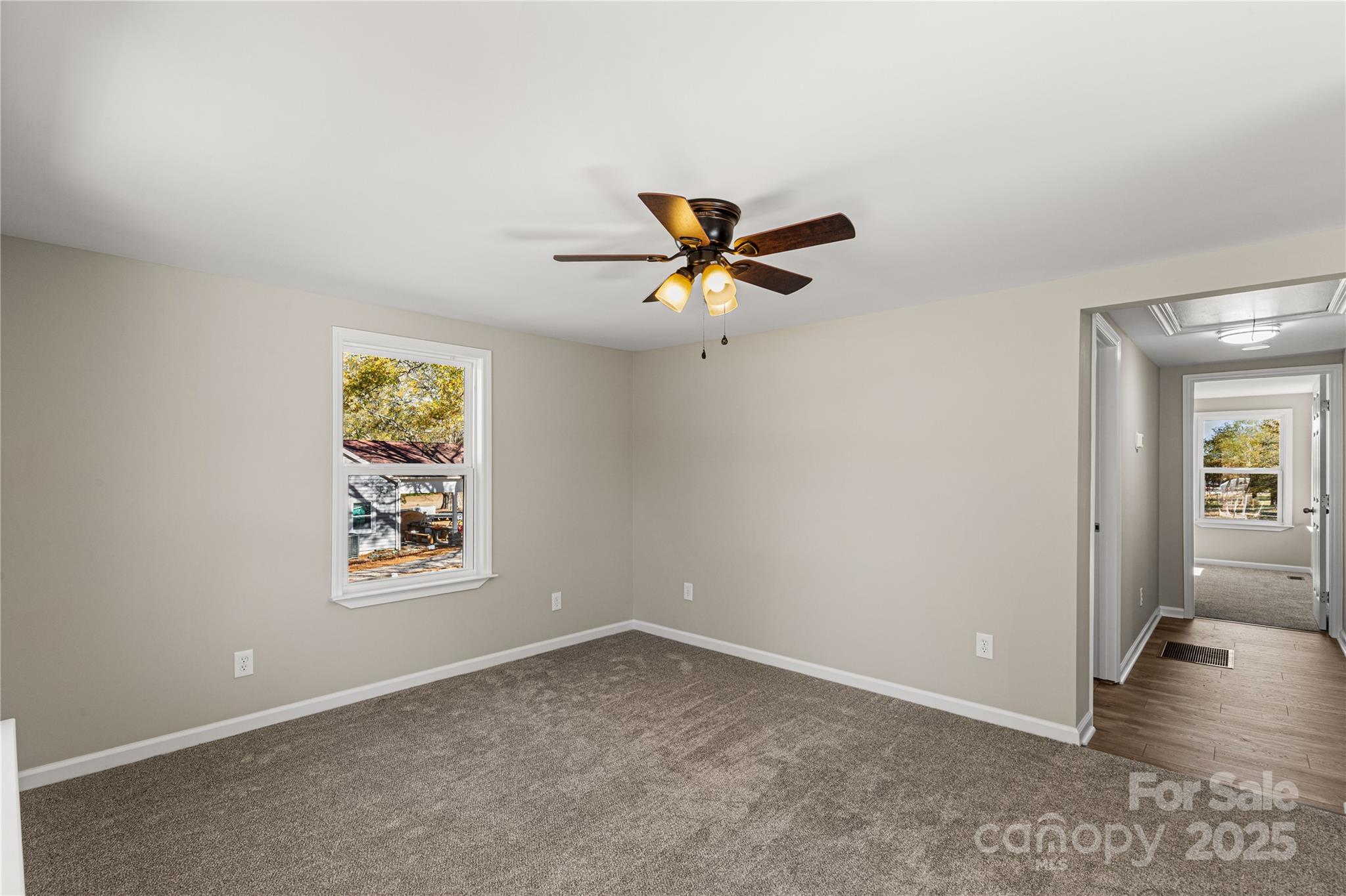 2429 State Rd S-29-746 Lancaster, SC 29720 - Photo 15 of 31 an empty room with window and wooden floor