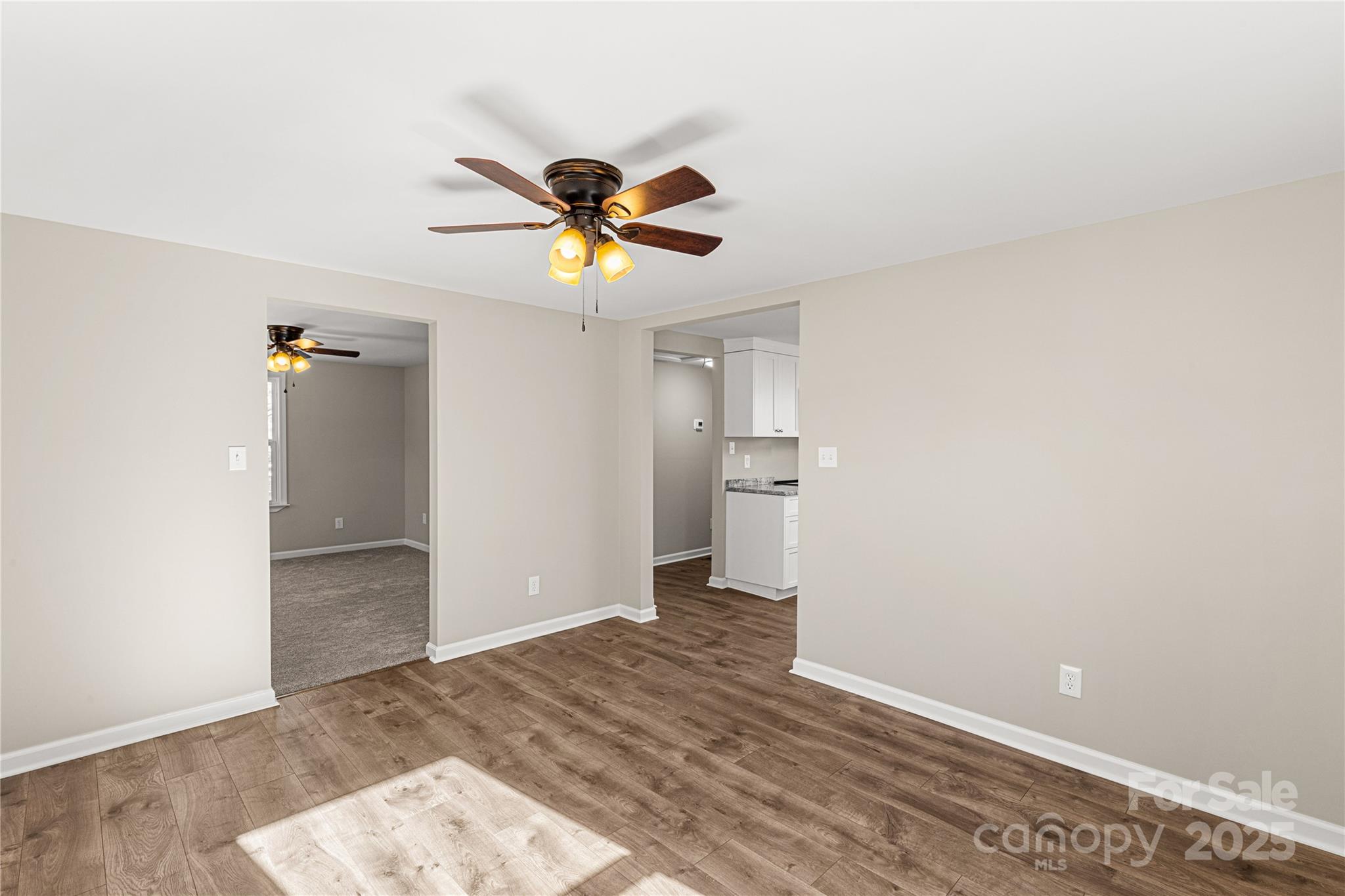 2429 State Rd S-29-746 Lancaster, SC 29720 - Photo 20 of 31 a view of empty room with wooden floor and ceiling fan