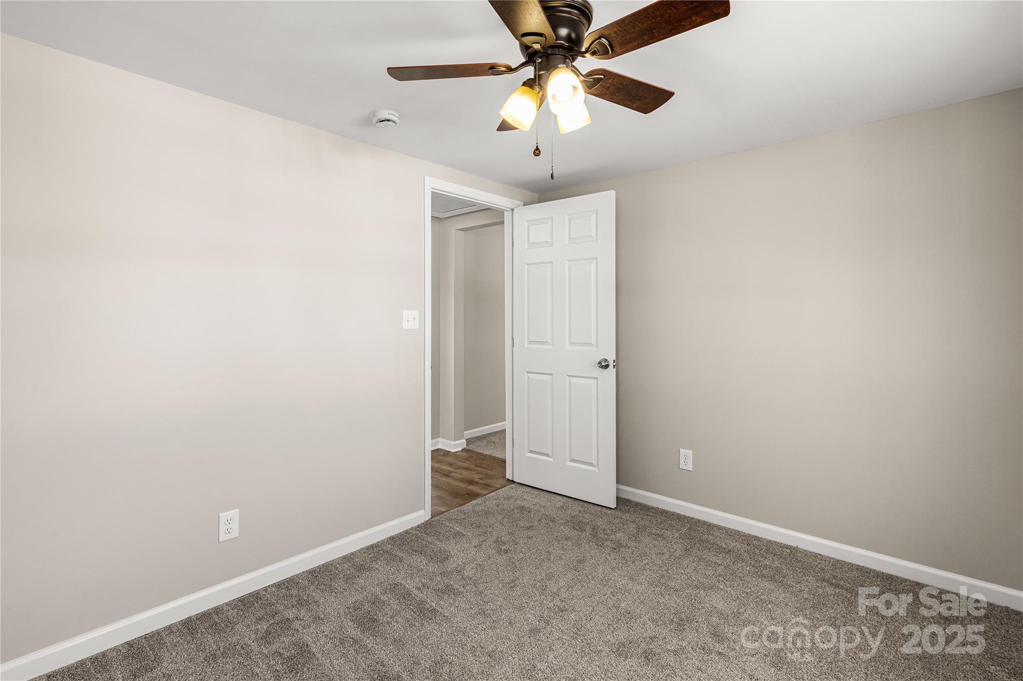 2429 State Rd S-29-746 Lancaster, SC 29720 - Photo 29 of 31 an empty room with chandelier fan
