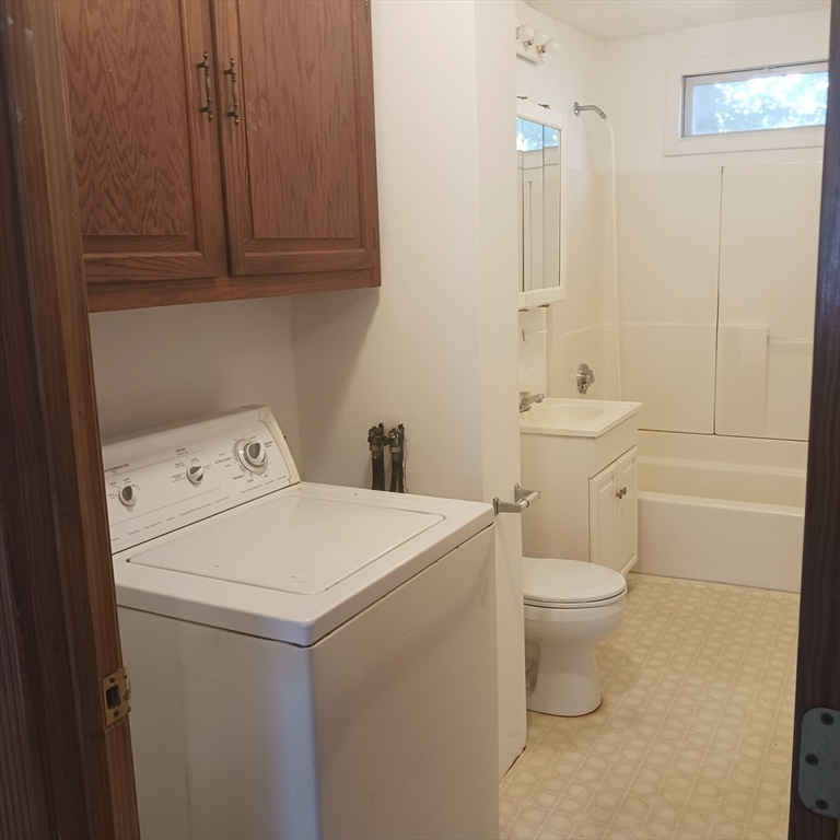 14 Douglas Court Worcester, MA 01603 - Photo 9 of 20 a utility room with dryer and washer