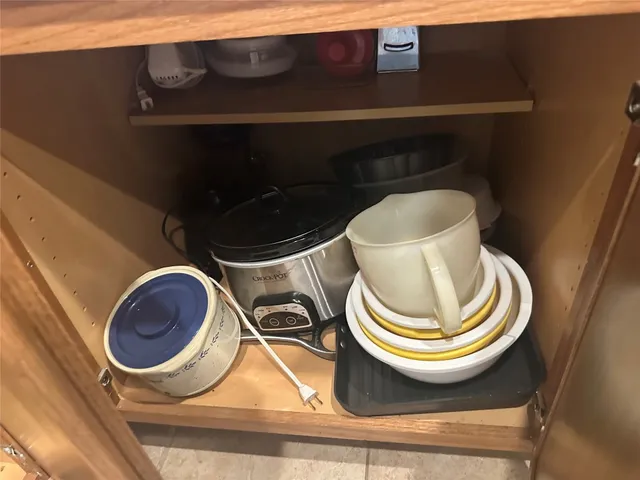 a kitchen with a stove and a sink