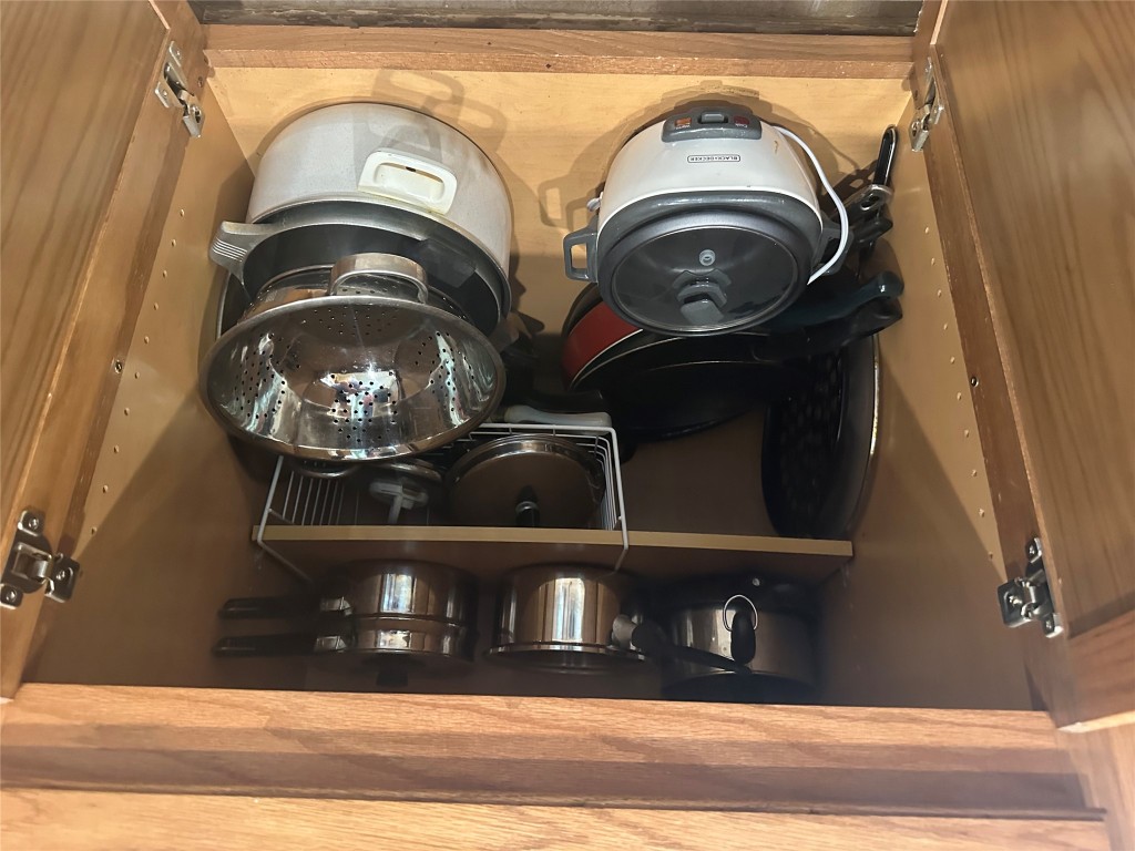 340 Portsmouth Drive Georgetown, TX 78633 - Photo 15 of 17 a kitchen with a stove and a sink