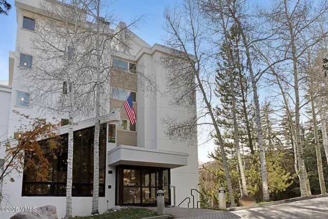 a view of a city street from a building