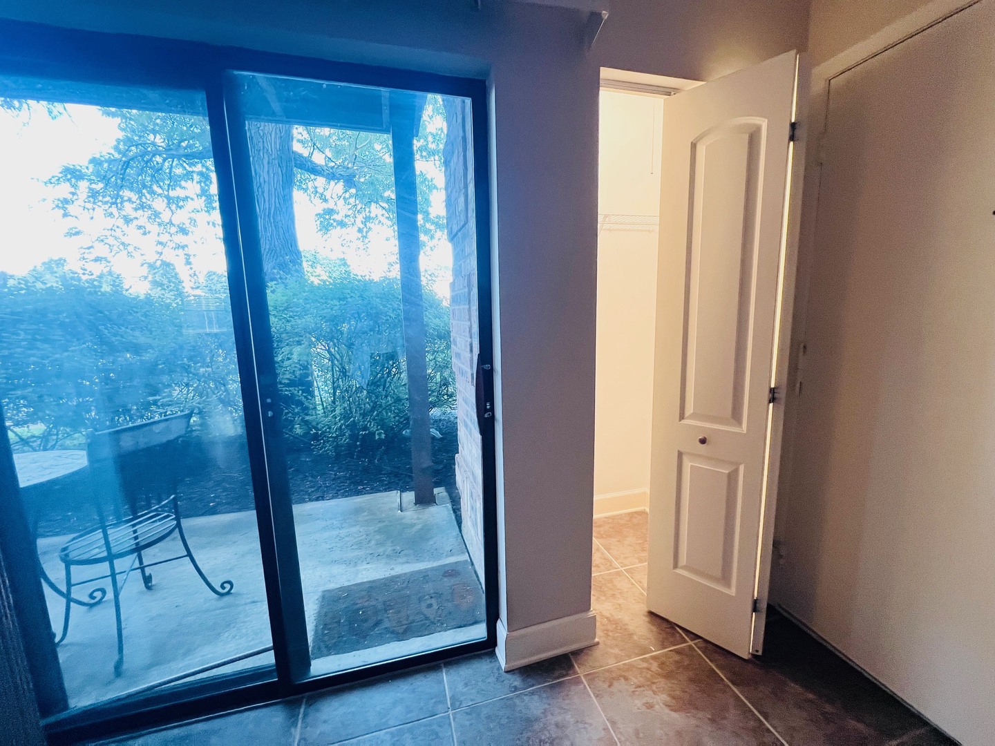2219 Nichols Road, Unit 17A Arlington Heights, IL 60004 - Photo 11 of 19 a bathroom with a glass shower door
