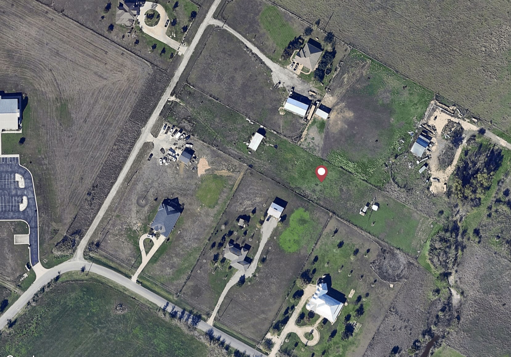 5102 Turnersville Road Creedmoor, TX 78610 - Photo 4 of 5 an aerial view of a house