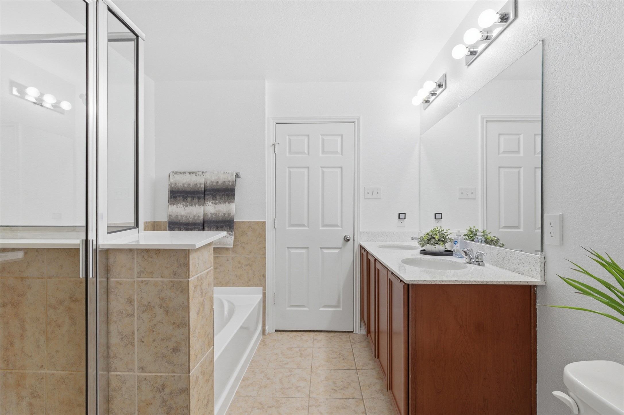 101 Magpie Goose Lane Leander, TX 78641 - Photo 14 of 29 a bathroom with a sink and mirror