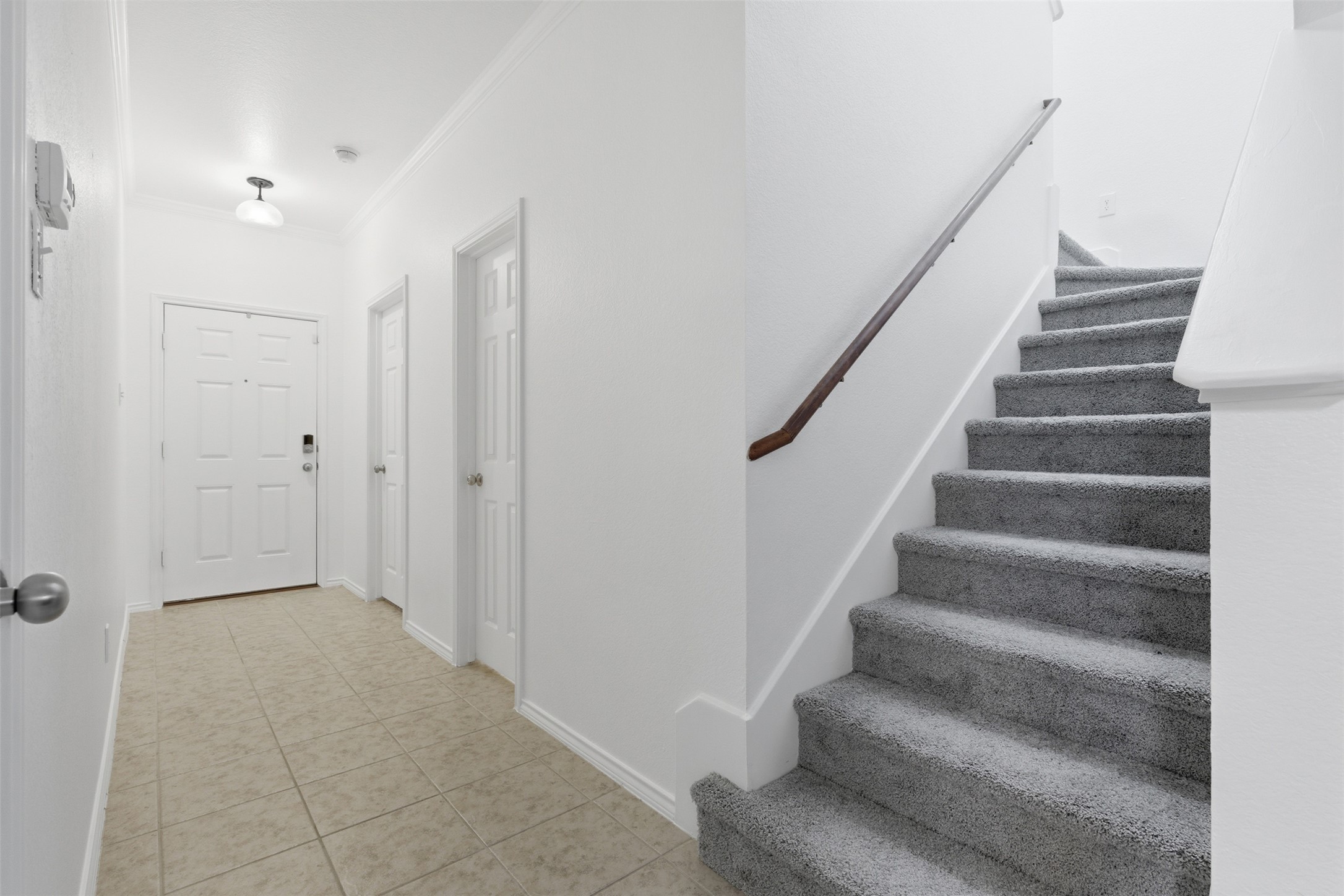 101 Magpie Goose Lane Leander, TX 78641 - Photo 2 of 29 a view of an entryway with staircase