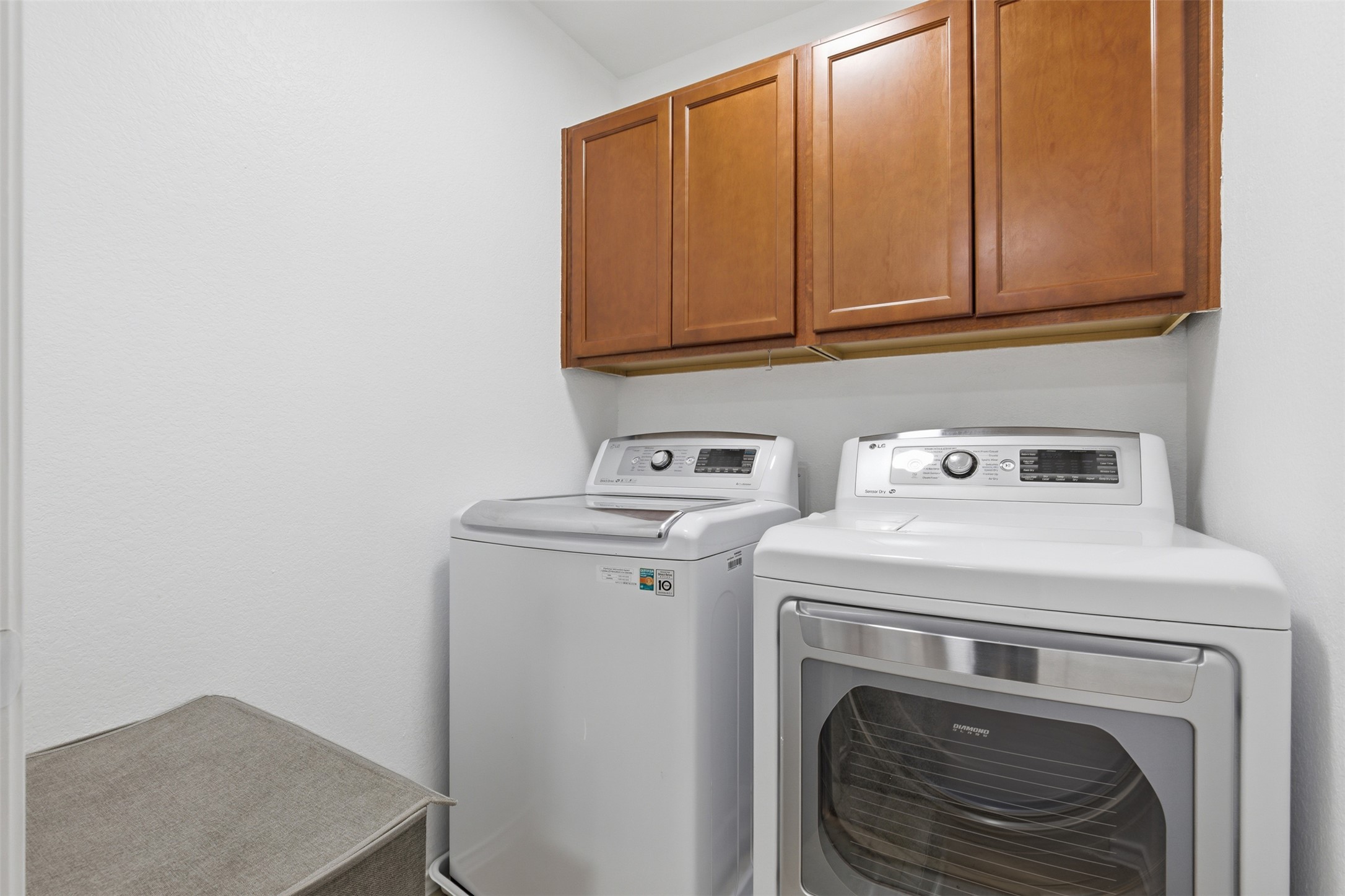 101 Magpie Goose Lane Leander, TX 78641 - Photo 27 of 29 a utility room with dryer and washer