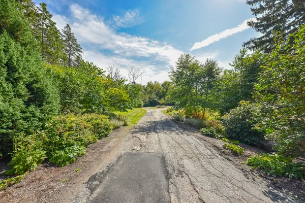$1,125,000 | 705 West Bradley Road, River Hills, WI 53217