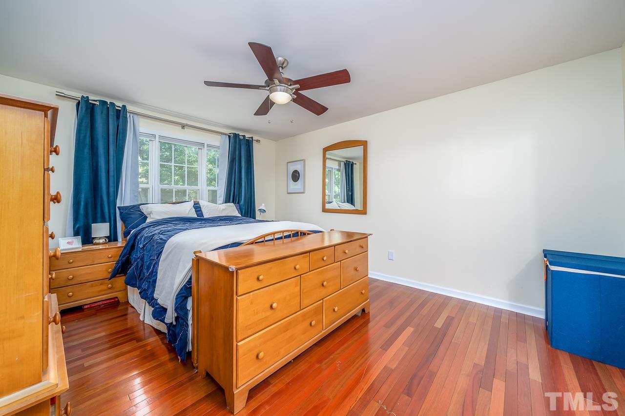 713 Windcrest Road Durham, NC 27713 - Photo 15 of 27 Downstairs master retreat with hardwoods and en-suite bath.