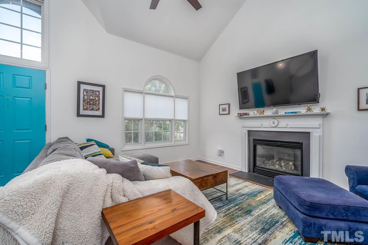 713 Windcrest Road Durham, NC 27713 - Photo 4 of 27 Lovely gas fireplace is cozy and beautiful.