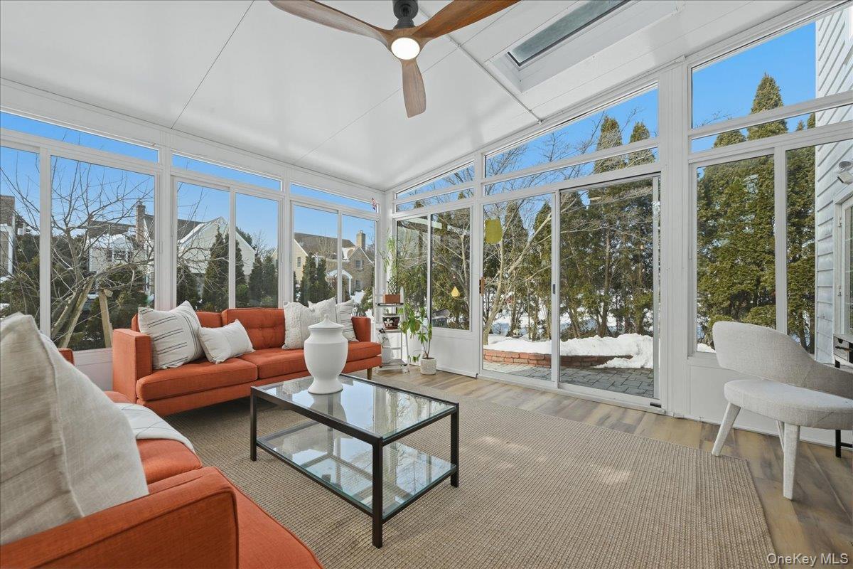 210 Clinton Road Garden City, NY 11530 - Photo 27 of 31 a outdoor living space with furniture and garden view