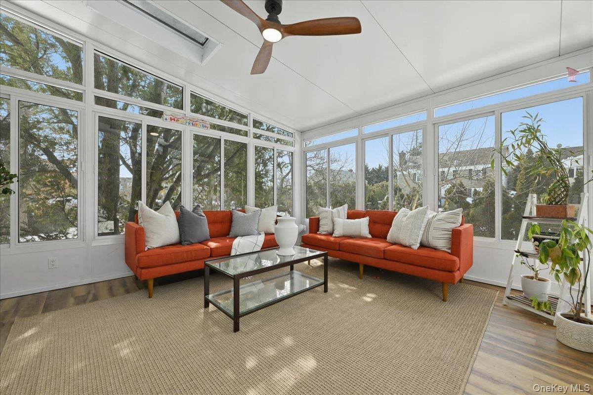 210 Clinton Road Garden City, NY 11530 - Photo 28 of 31 a outdoor living space with furniture and a potted plant