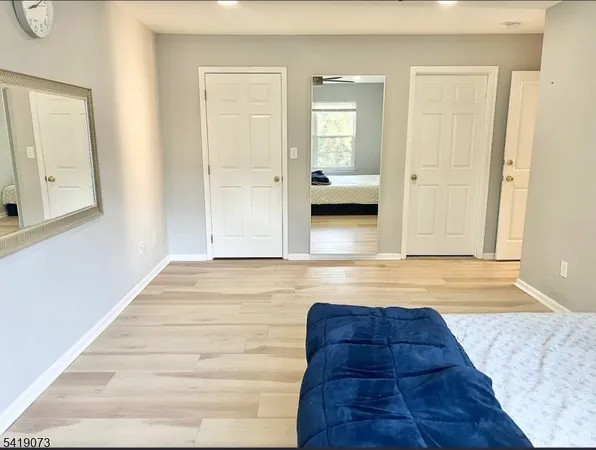 a view of living room with furniture and window