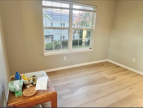 a room with a bed and a window