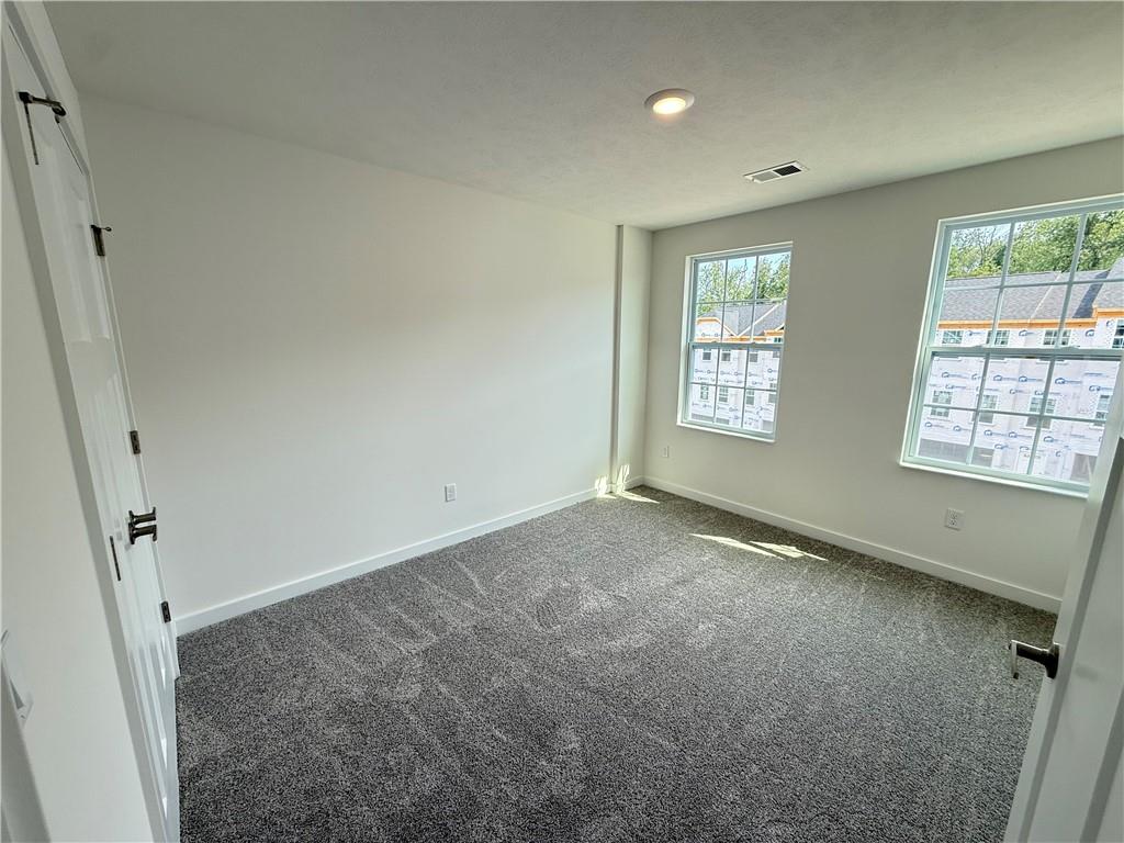 175 Lockheed Drive Coraopolis, PA 15108 - Photo 16 of 17 a view of an empty room with a window