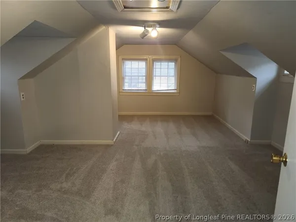 an empty room that has a window