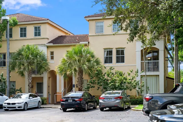 a car parked in front of a house