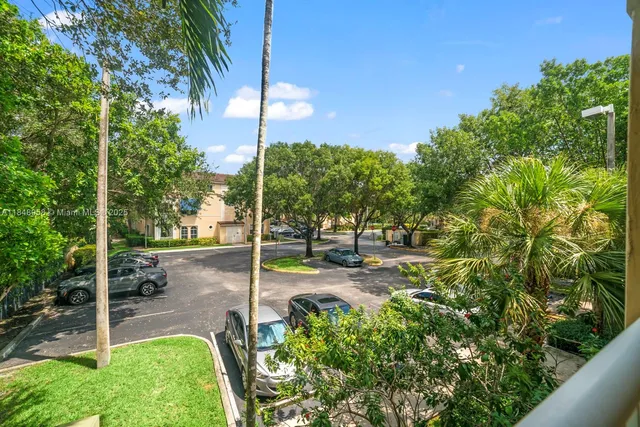 a view of a park with trees