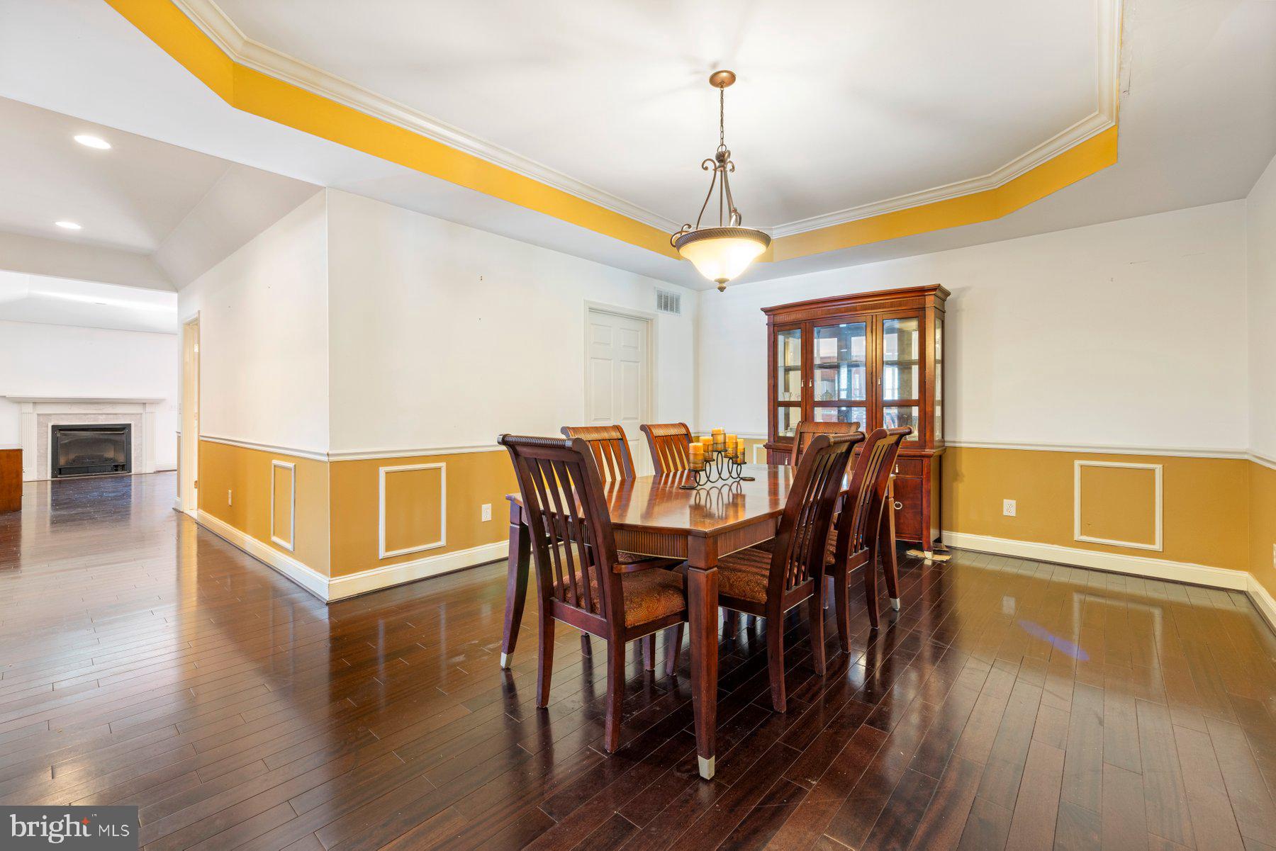 61 Magothy Beach Road Pasadena, MD 21122 - Photo 14 of 63 a view of a dining room with furniture window and wooden floor