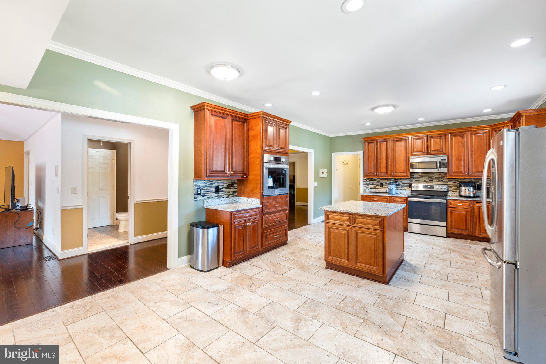 61 Magothy Beach Road Pasadena, MD 21122 - Photo 20 of 63 a large kitchen with granite countertop lots of counter top space