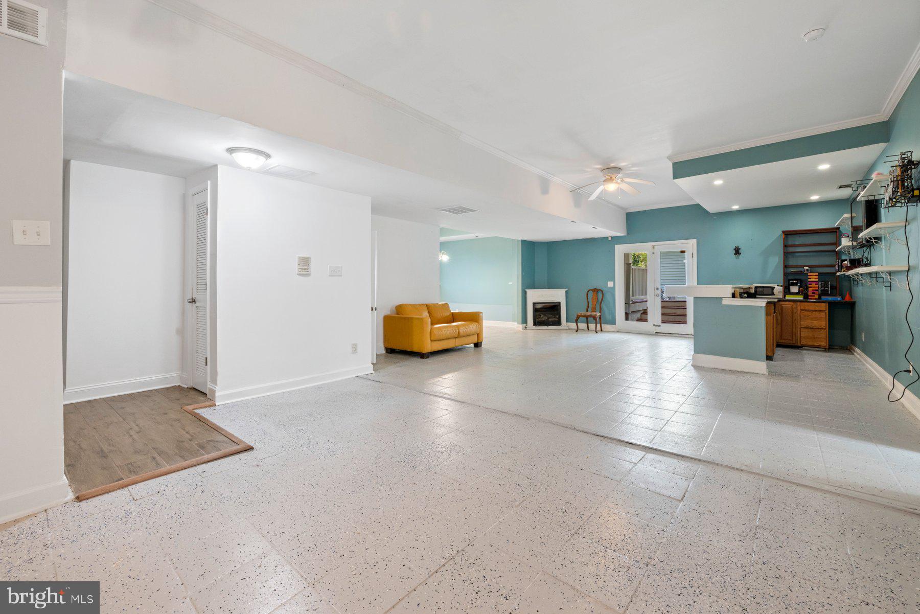 61 Magothy Beach Road Pasadena, MD 21122 - Photo 43 of 63 a living room with furniture and kitchen view