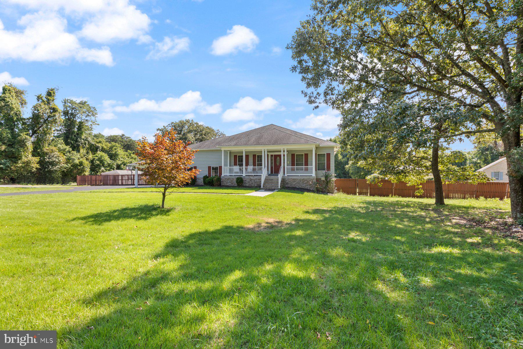 61 Magothy Beach Road Pasadena, MD 21122 - Photo 7 of 63 a view of house with a swimming pool