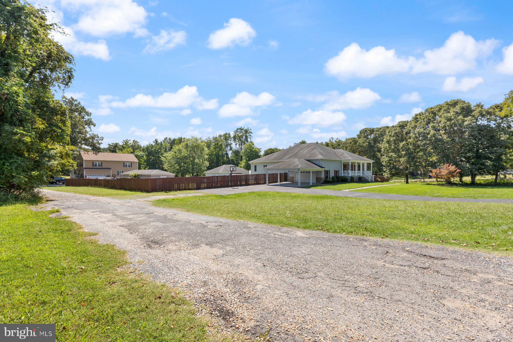 61 Magothy Beach Road Pasadena, MD 21122 - Photo 8 of 63 a view of a house with a big yard