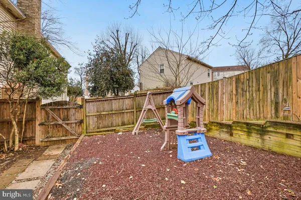 a view of outdoor space with a table and chairs