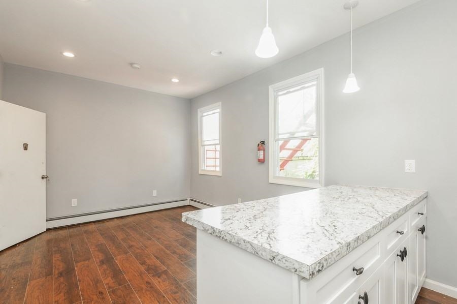 705 8th Street, Unit 2 Union City, NJ 07087 - Photo 12 of 19 an empty room with a window