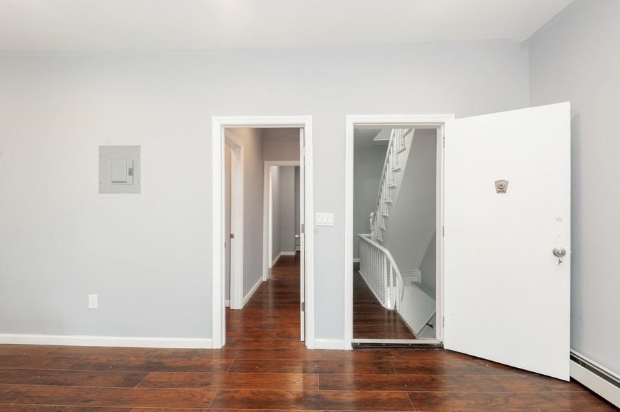 705 8th Street, Unit 2 Union City, NJ 07087 - Photo 8 of 19 a view of entryway with wooden floor