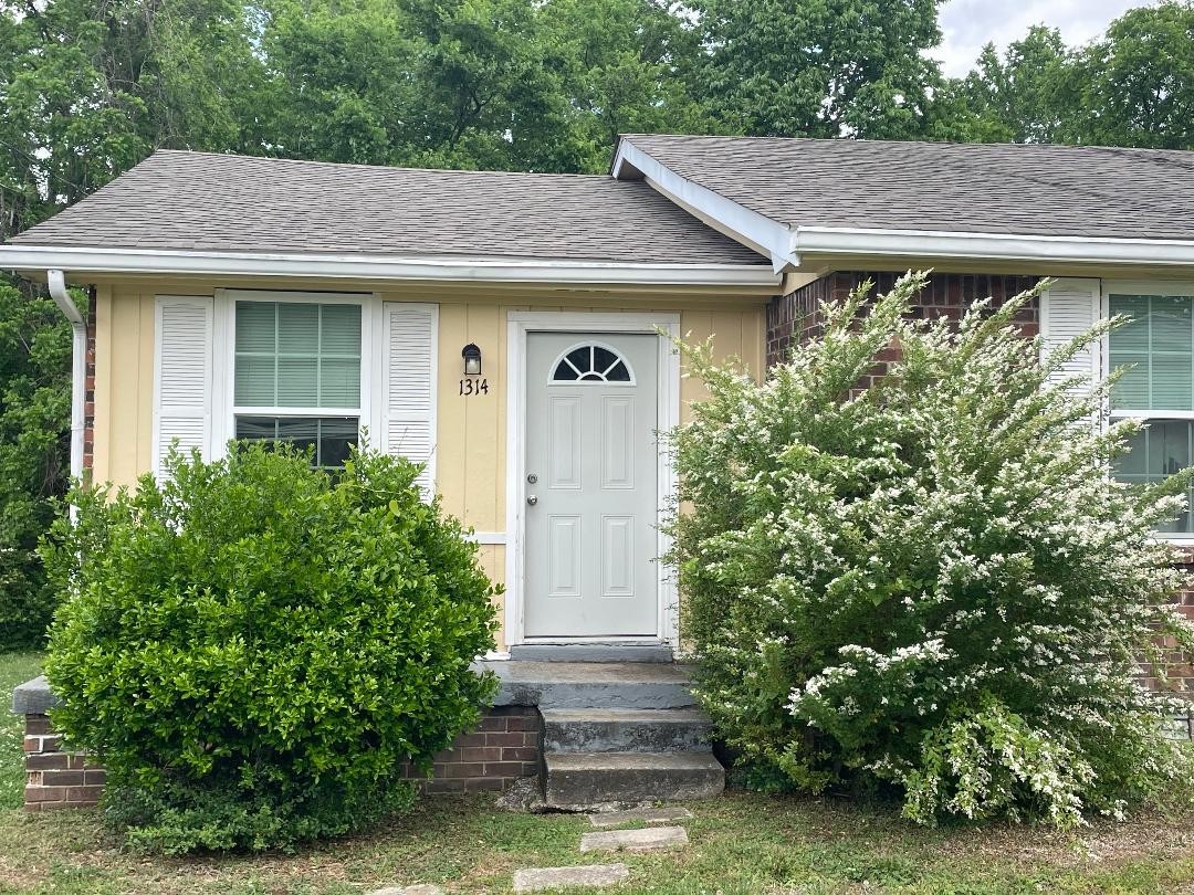 1314 Bellshire Terrace Drive Nashville, TN 37207 - Photo 1 of 15 a front view of a house with garden