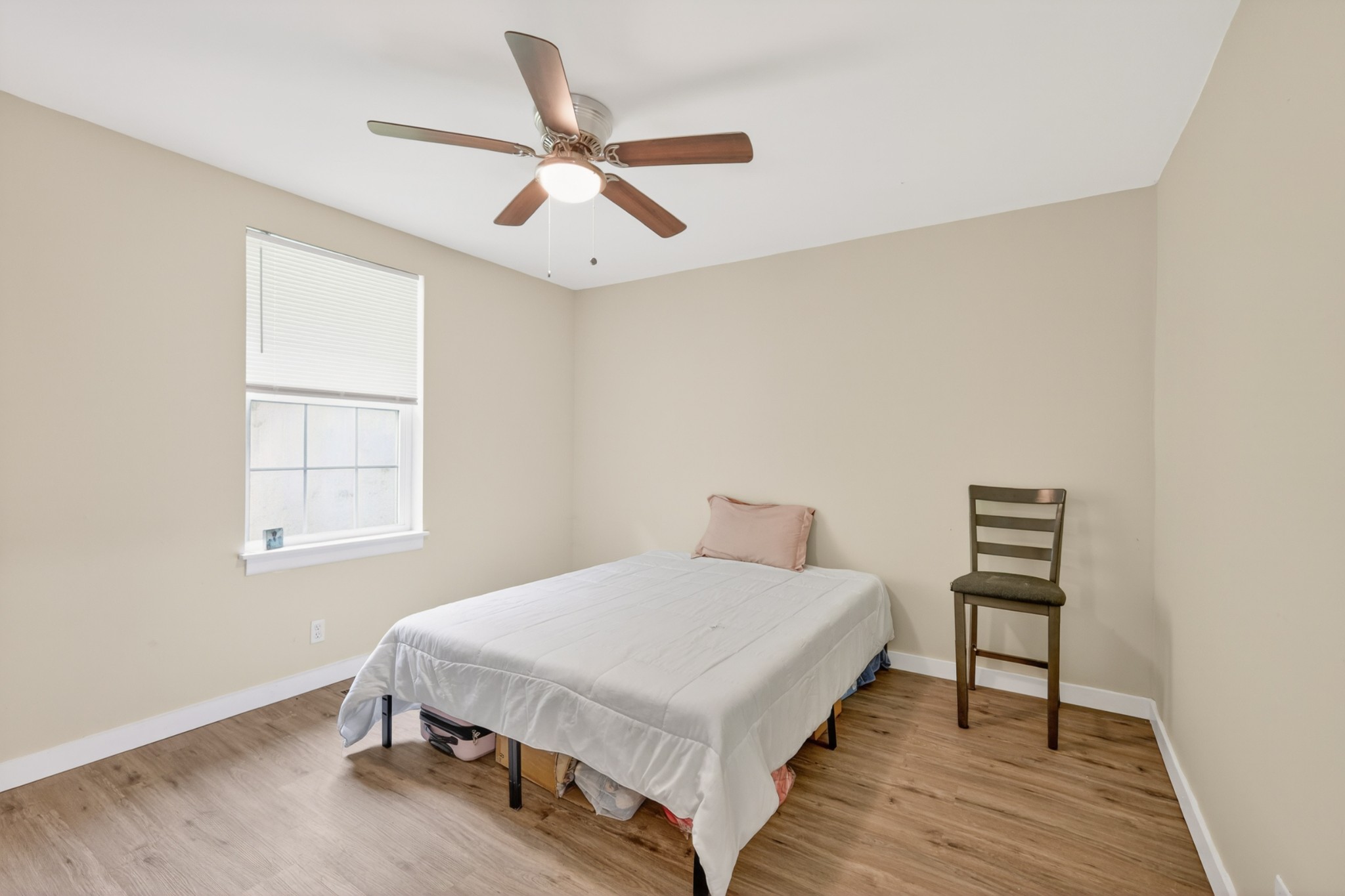 1314 Bellshire Terrace Drive Nashville, TN 37207 - Photo 9 of 15 a bedroom with a bed and a chandelier