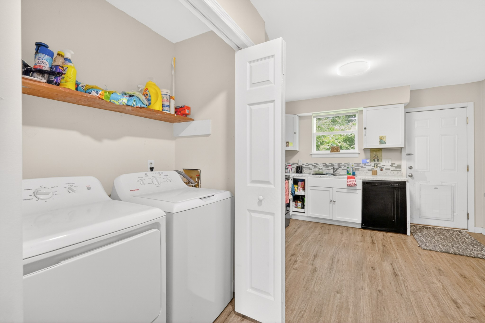 1314 Bellshire Terrace Drive Nashville, TN 37207 - Photo 10 of 15 a utility room with cabinets washer and dryer