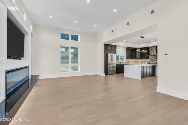 a view of a kitchen with a sink and an oven