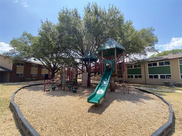 a house with trees in the background