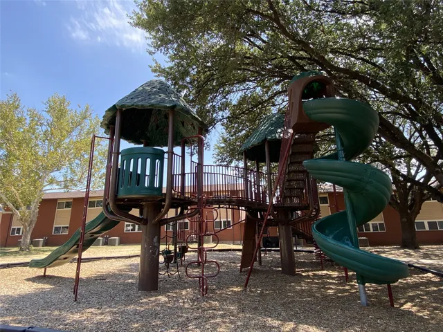 a view of a backyard of a house