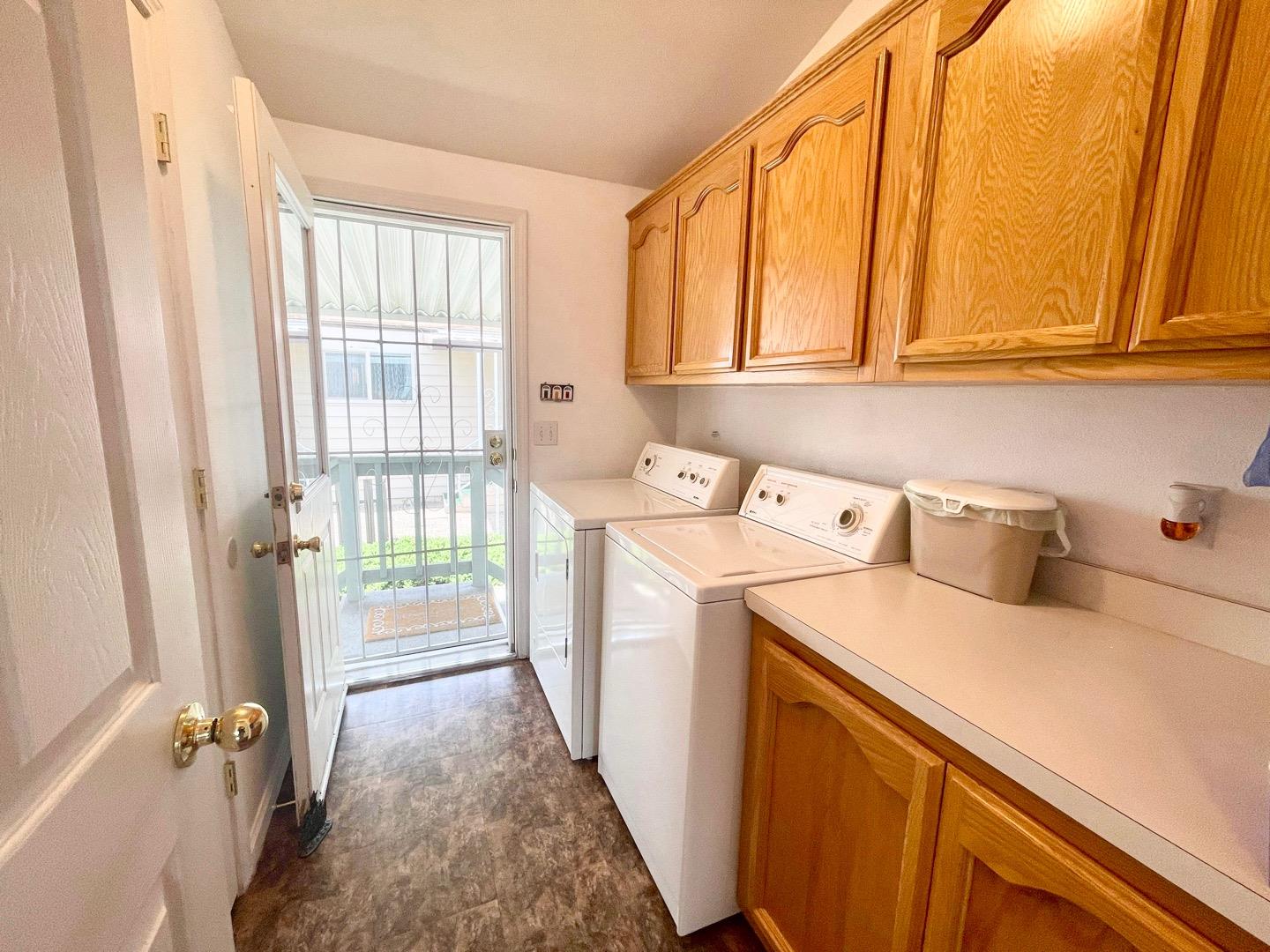 711 Old Canyon Road, Unit 13 Fremont, CA 94536 - Photo 12 of 26 a utility room with dryer and washer