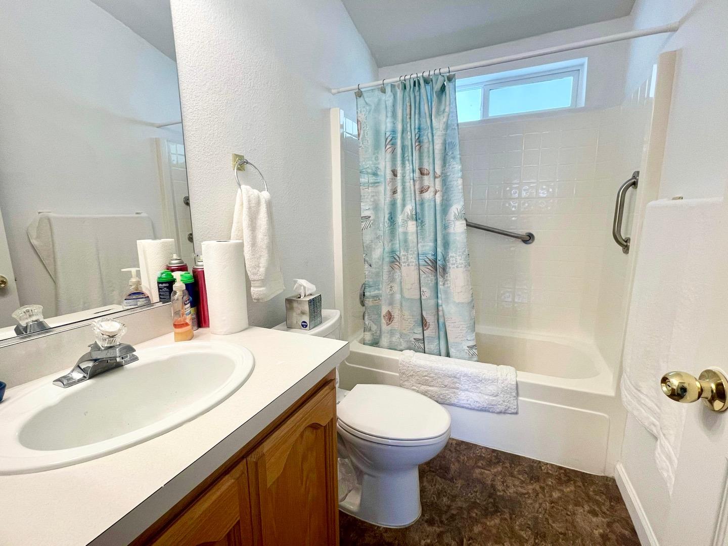 711 Old Canyon Road, Unit 13 Fremont, CA 94536 - Photo 15 of 26 a bathroom with a sink toilet and shower