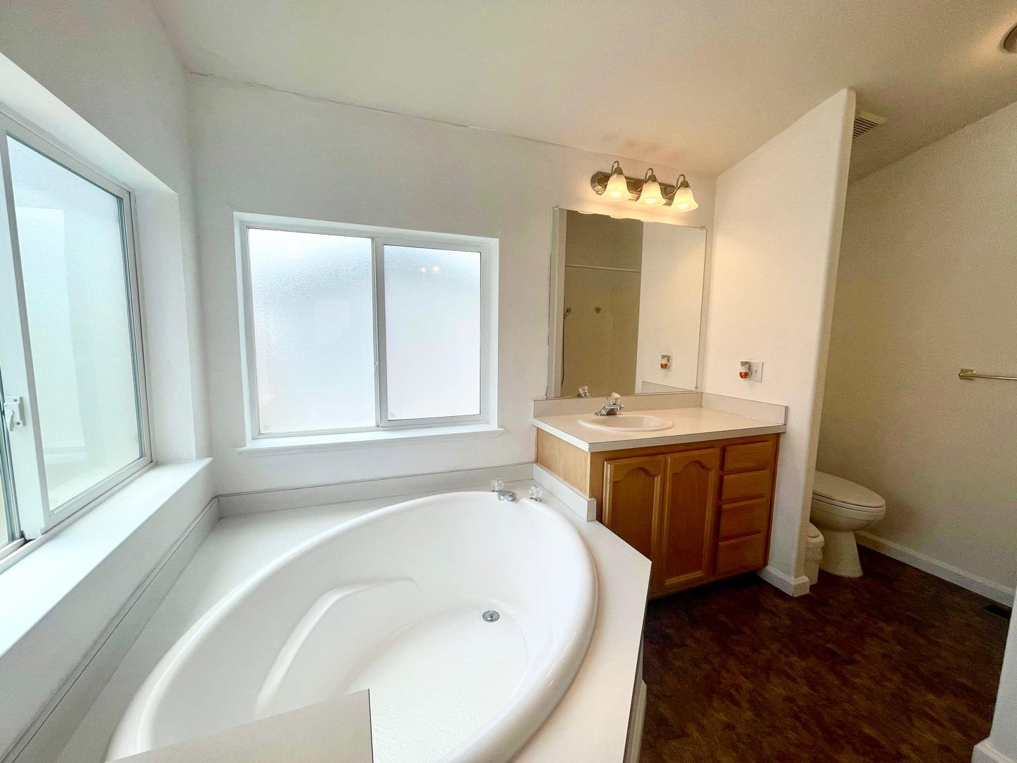 711 Old Canyon Road, Unit 13 Fremont, CA 94536 - Photo 20 of 26 a bathroom with a sink and a mirror