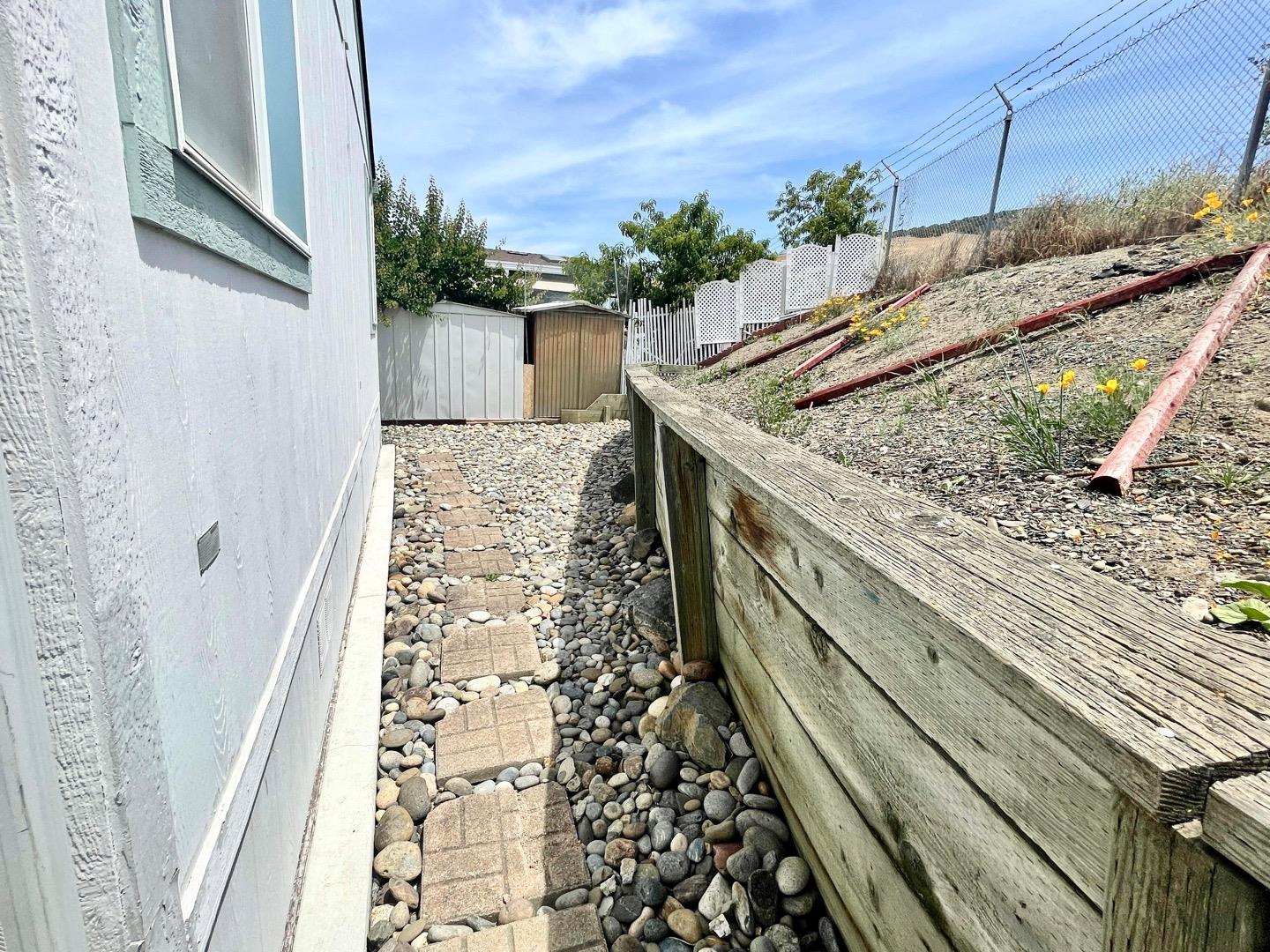 711 Old Canyon Road, Unit 13 Fremont, CA 94536 - Photo 24 of 26 a view of a backyard of the house