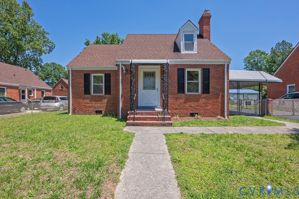 3400 Ryburn Road Richmond, VA 23234 - Photo 1 of 45 Brick exterior featuring a gabled roof and a dorme