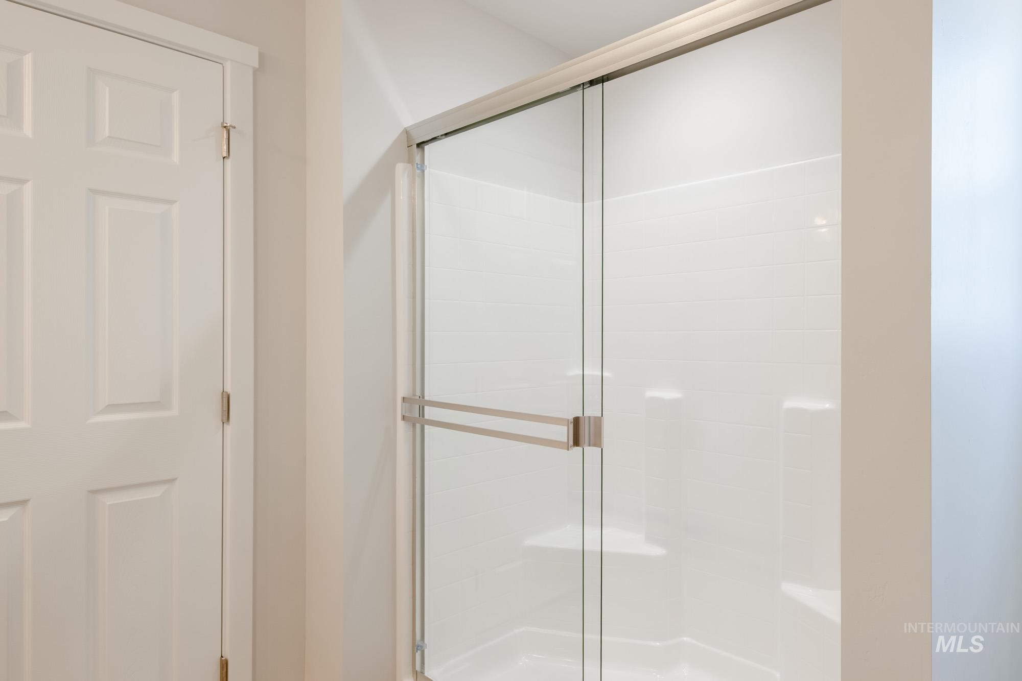 2462 West Fallon Loop Nampa, ID 83651 - Photo 16 of 23 Bathroom featuring a shower stall